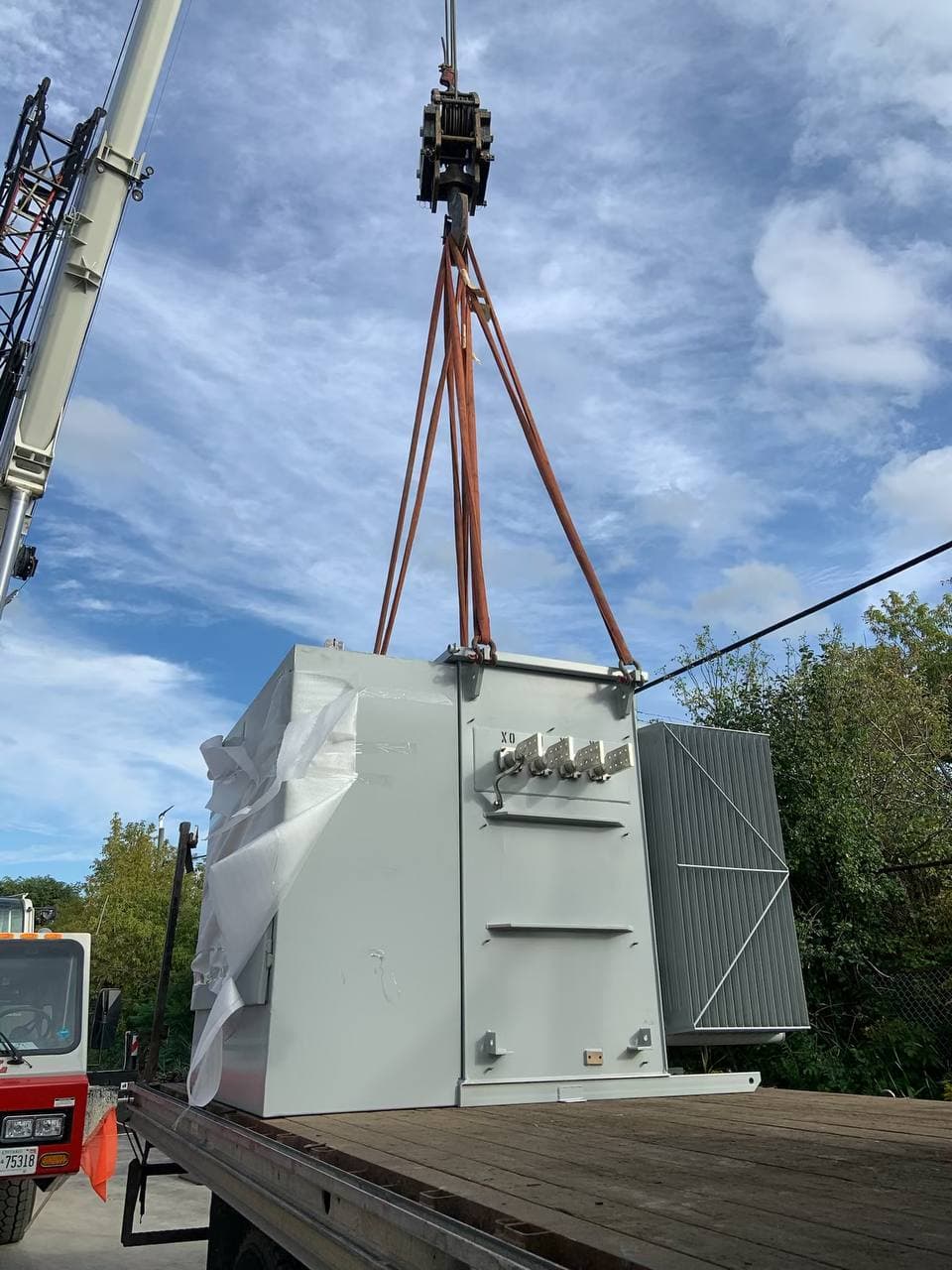 Transformer crane-set onto concrete pad